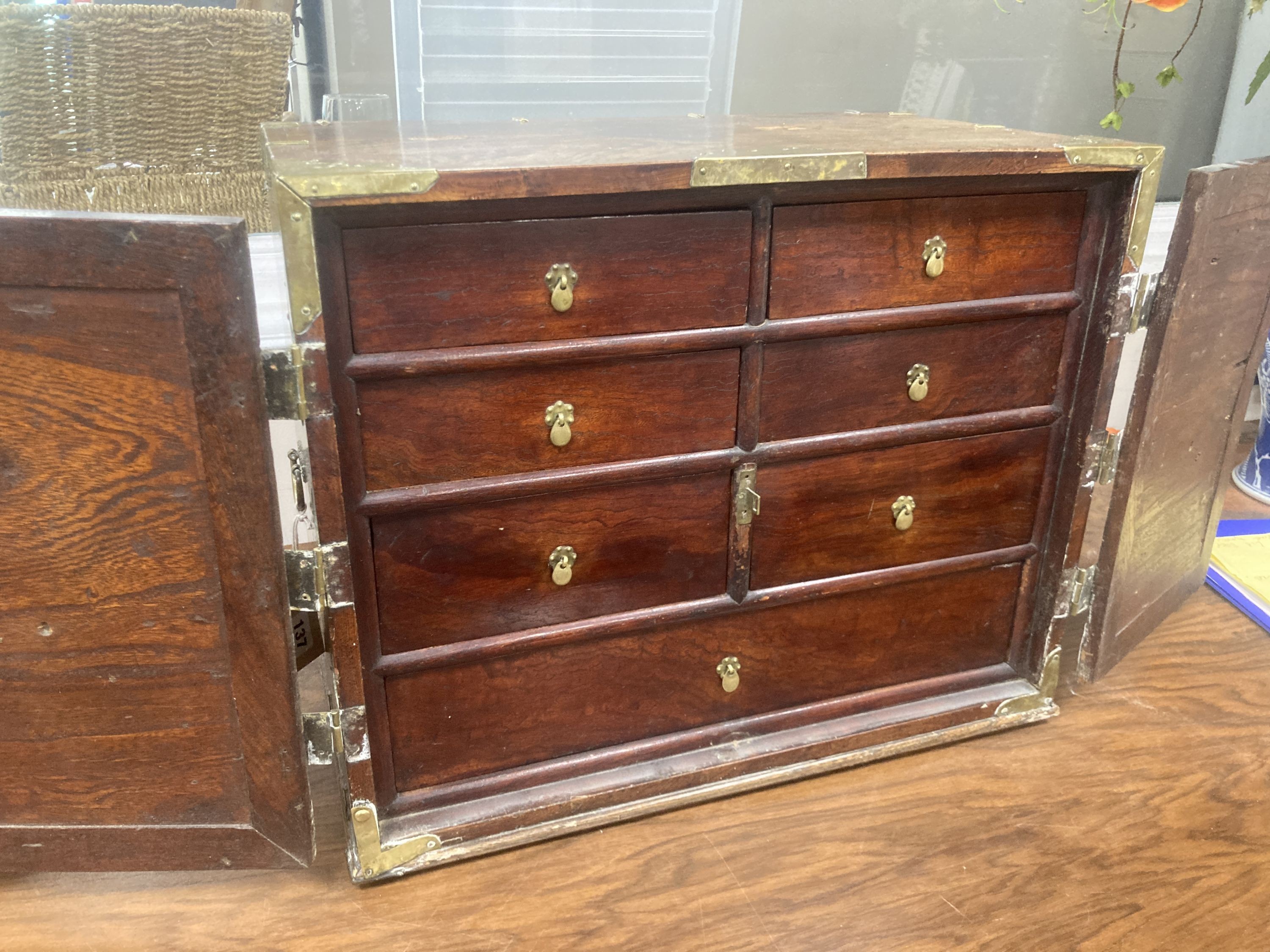 A Korean brass-bound elm small cabinet, H 43cm W 54cm x D 32.5cm